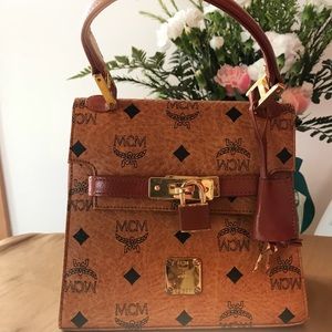 MCM lock & key mini handbag in Cognac